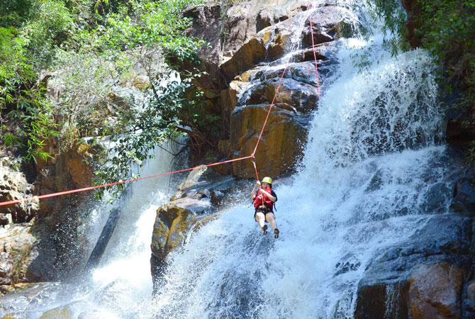 Swing over a waterfall in Da Lat